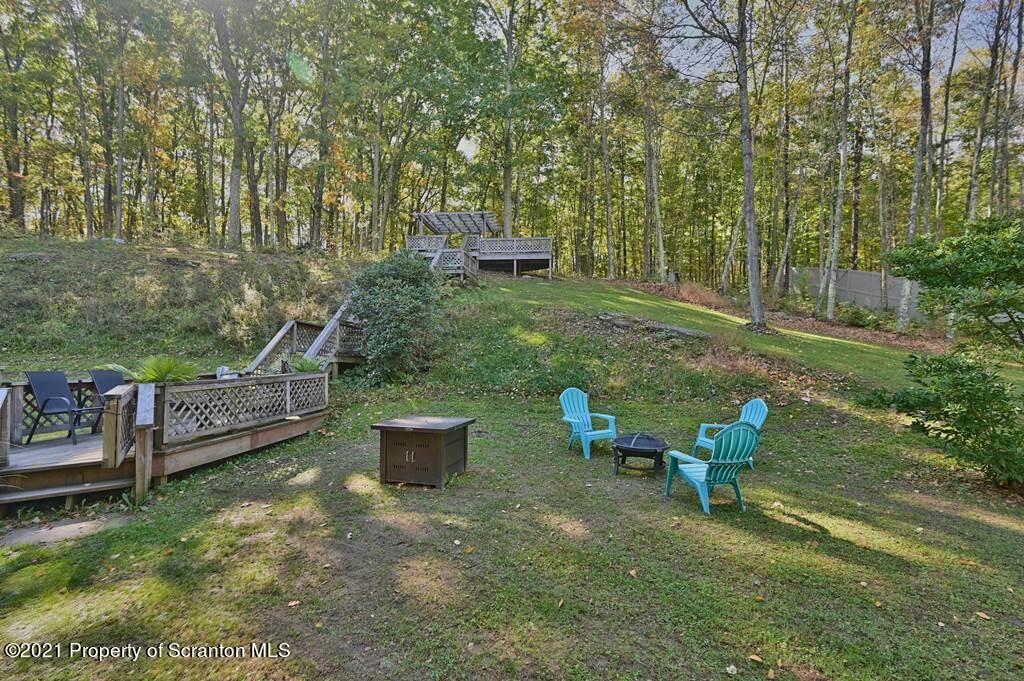 113 Marcy Road Tunkhannock, PA 18657 - Photo 67 of 82 a view of a chair and table in the garden