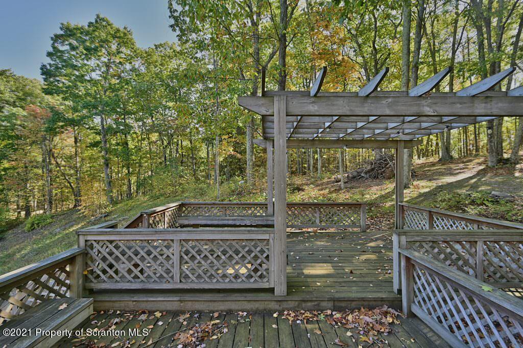 113 Marcy Road Tunkhannock, PA 18657 - Photo 76 of 82 a front view of a house with a tree