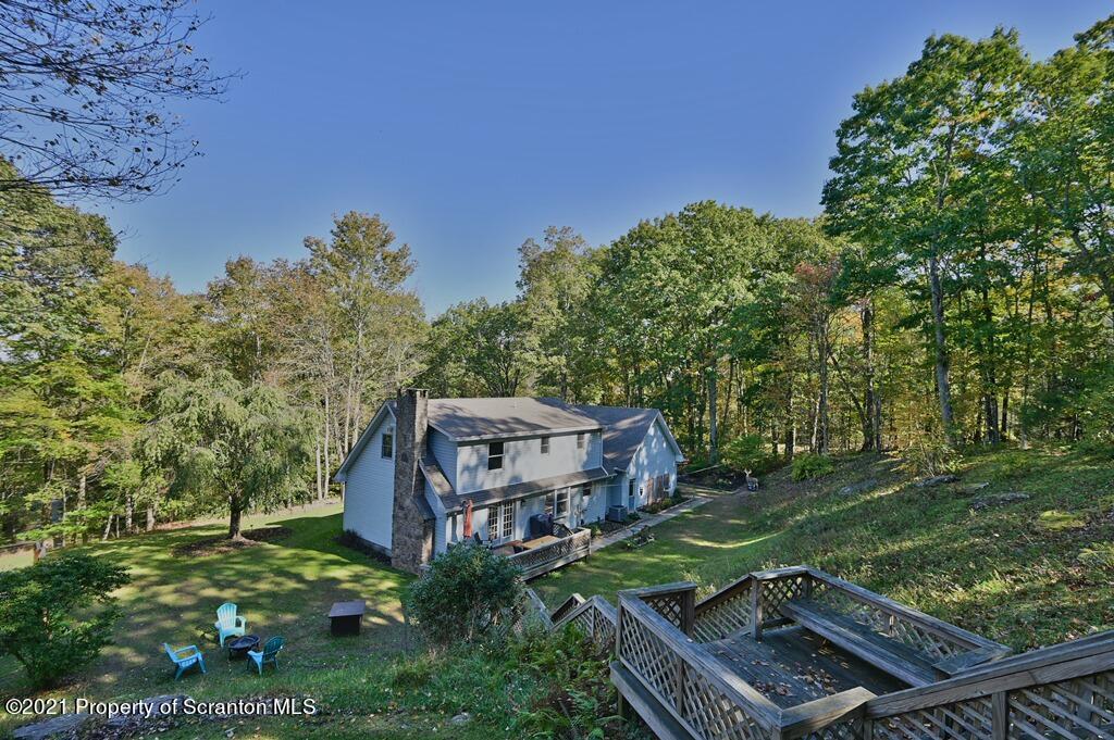 113 Marcy Road Tunkhannock, PA 18657 - Photo 77 of 82 a view of a wooden deck with a yard