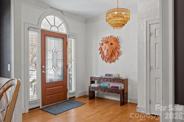 a reading room with furniture and a window
