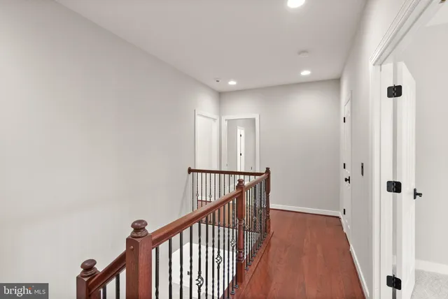 a bathroom with a sink double vanity and a mirror