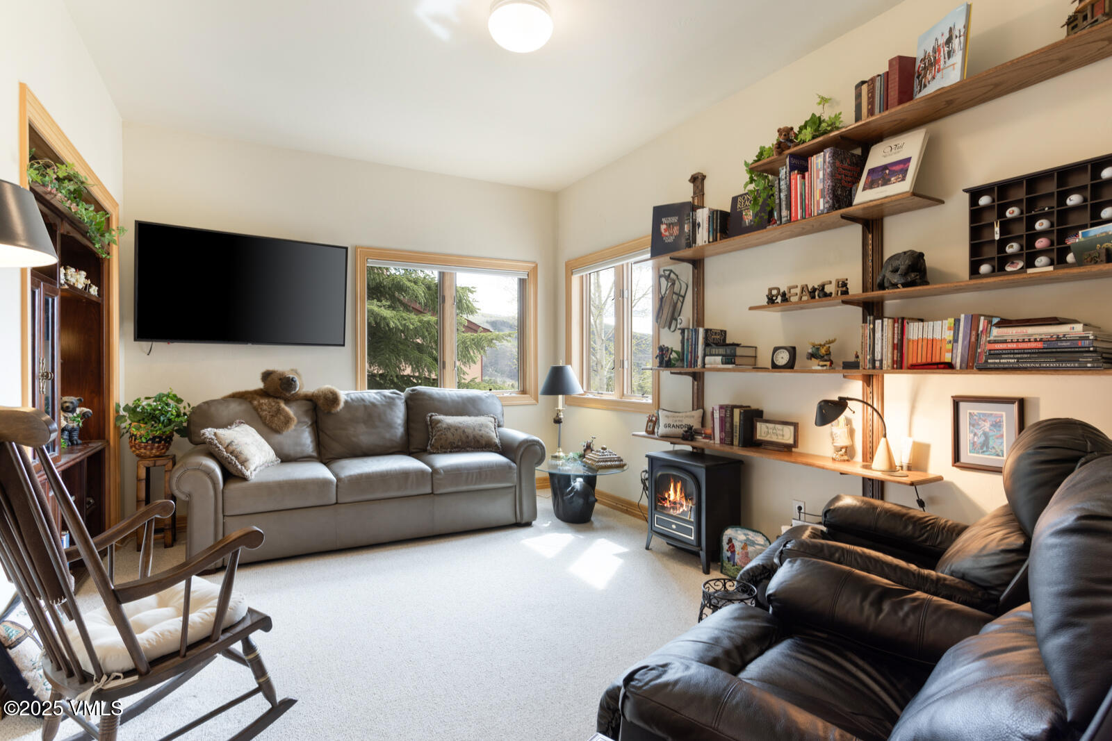 840 June Creek Road Edwards, CO 81632 - Photo 17 of 34 a living room with furniture and a flat screen tv