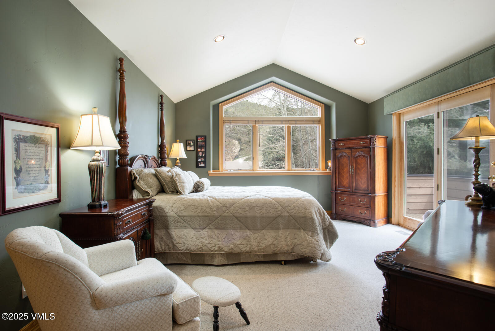 840 June Creek Road Edwards, CO 81632 - Photo 19 of 34 a spacious bedroom with a bed and glass window