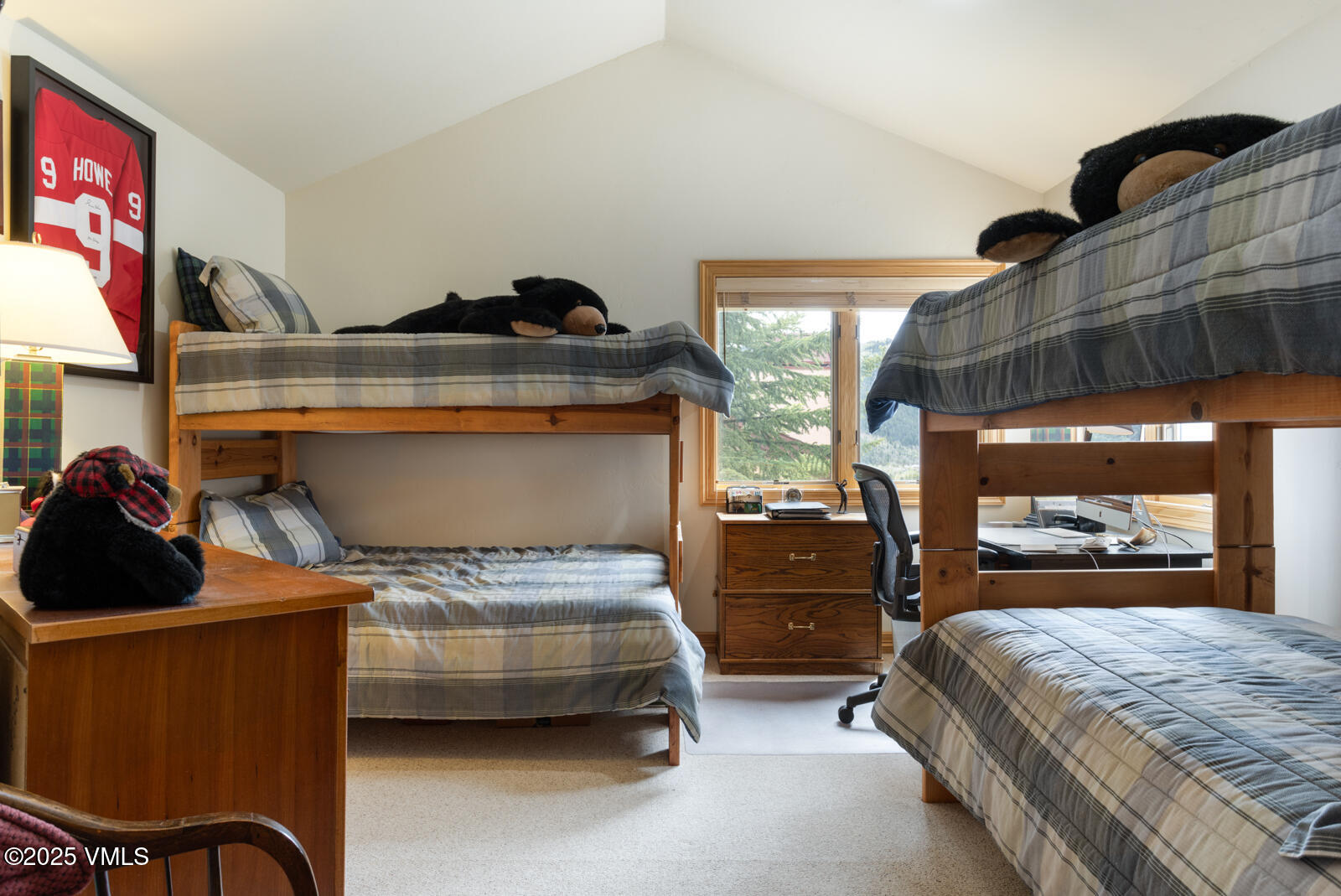 840 June Creek Road Edwards, CO 81632 - Photo 28 of 34 a bedroom with a bed and a dresser