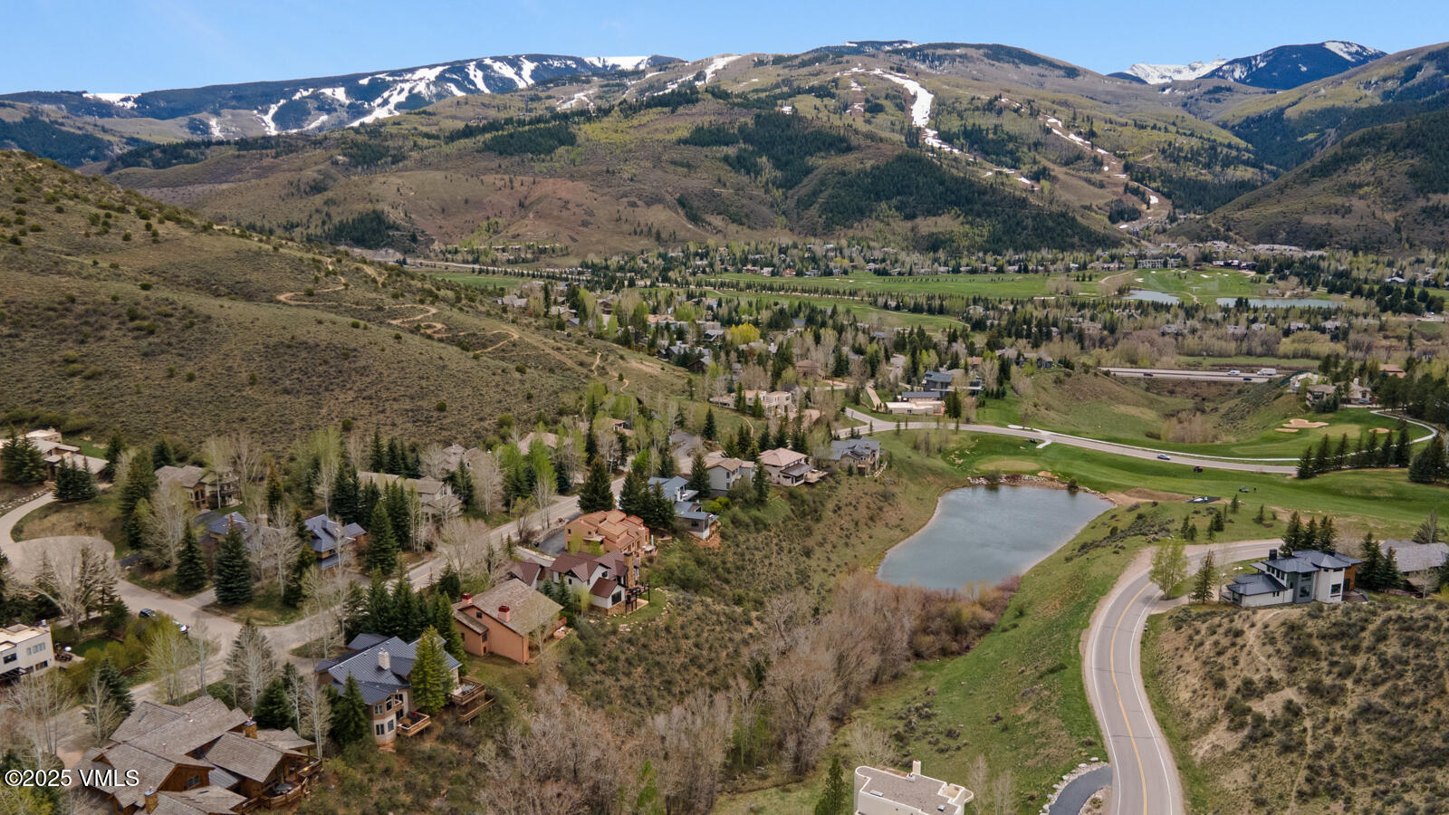 840 June Creek Road Edwards, CO 81632 - Photo 31 of 34 a view of a mountain with a lake