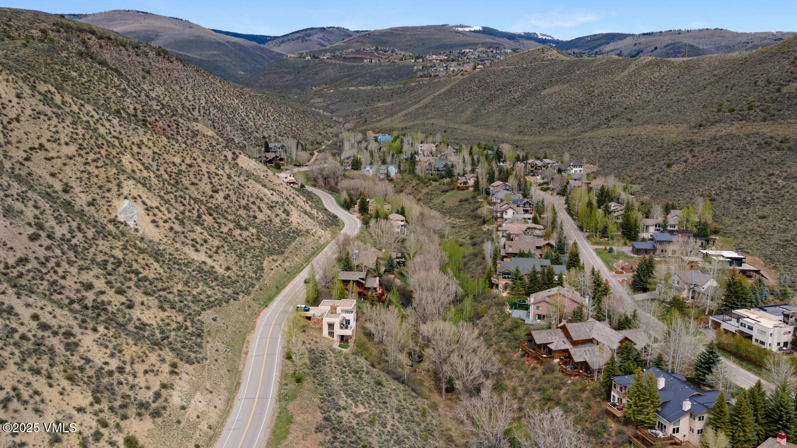 840 June Creek Road Edwards, CO 81632 - Photo 32 of 34 a view of a forest with mountains in the background