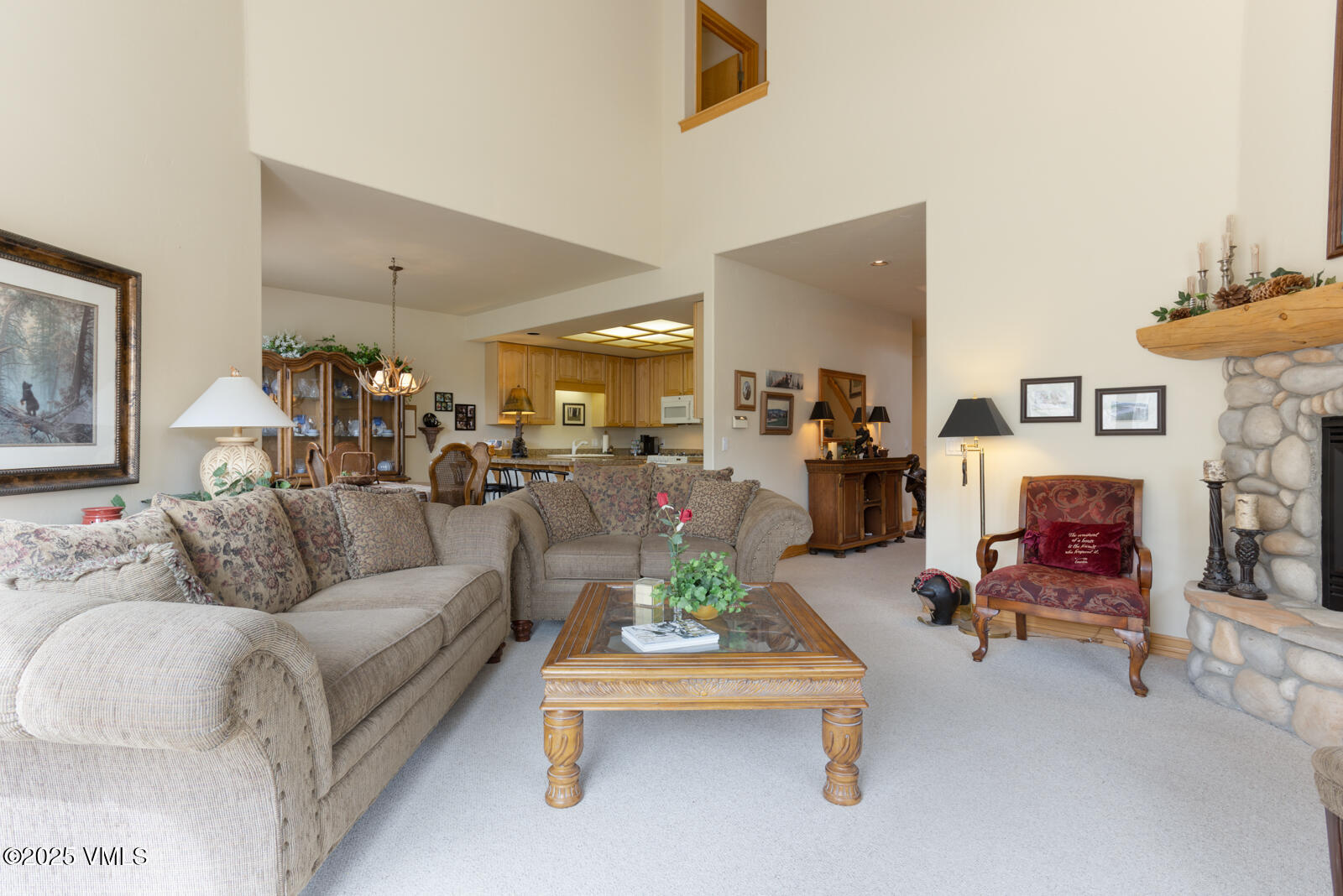 840 June Creek Road Edwards, CO 81632 - Photo 7 of 34 a living room with furniture and a table
