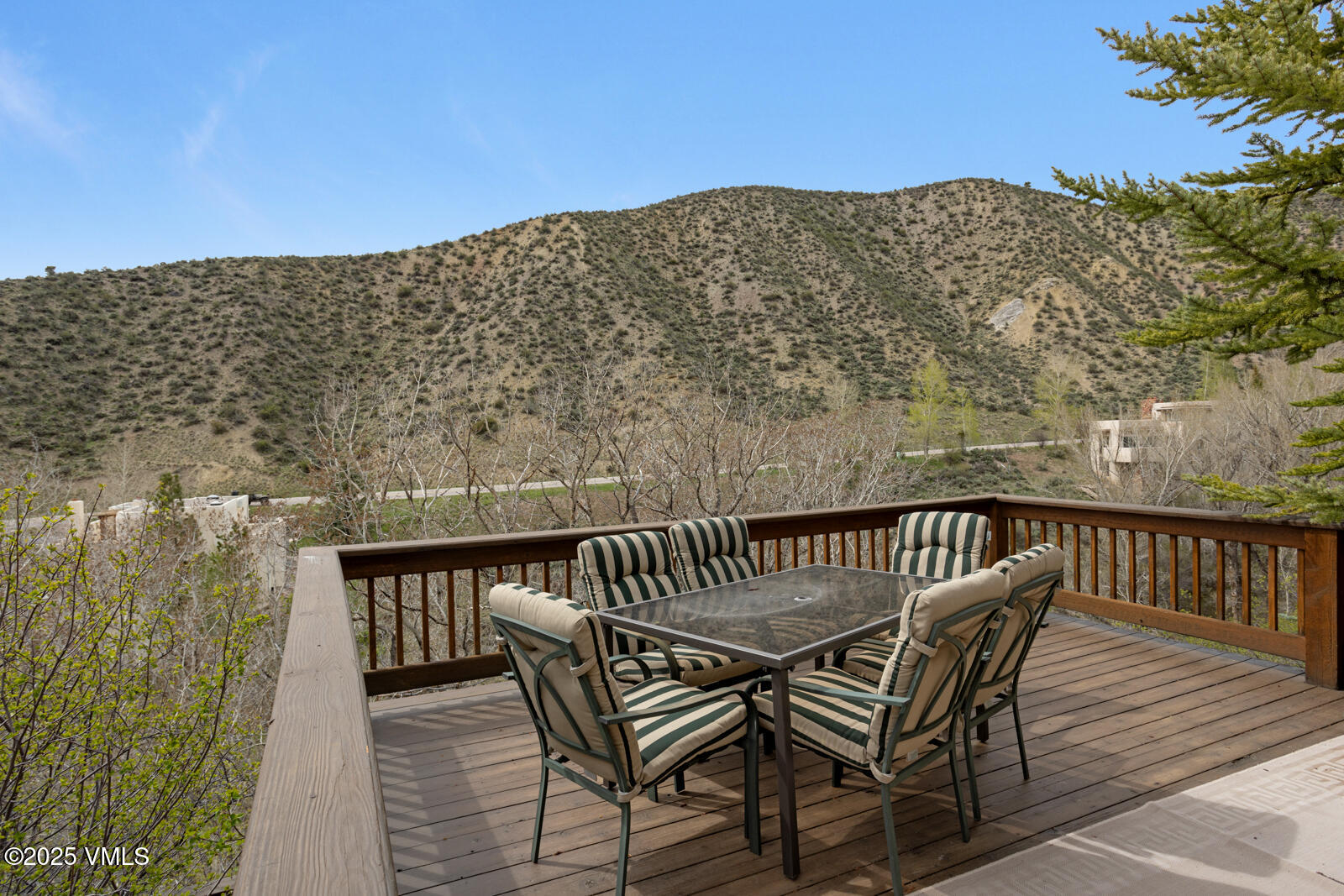 840 June Creek Road Edwards, CO 81632 - Photo 9 of 34 a view of balcony with wooden floor and outdoor seating