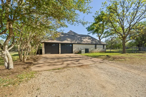 $975,000 | 28 Country Oaks Drive, Buda, TX 78610