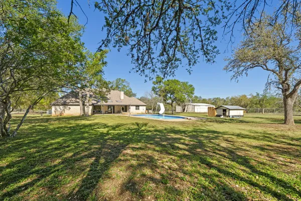 $975,000 | 28 Country Oaks Drive, Buda, TX 78610