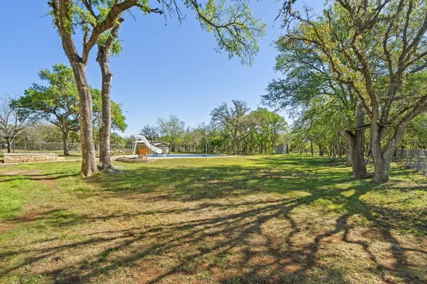 $975,000 | 28 Country Oaks Drive, Buda, TX 78610