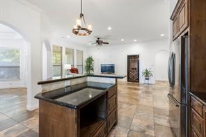 1155 Whipporwill Road Conroe, TX 77303 - Photo 21 of 34 Breakfast Bar with Built in Microwave Space