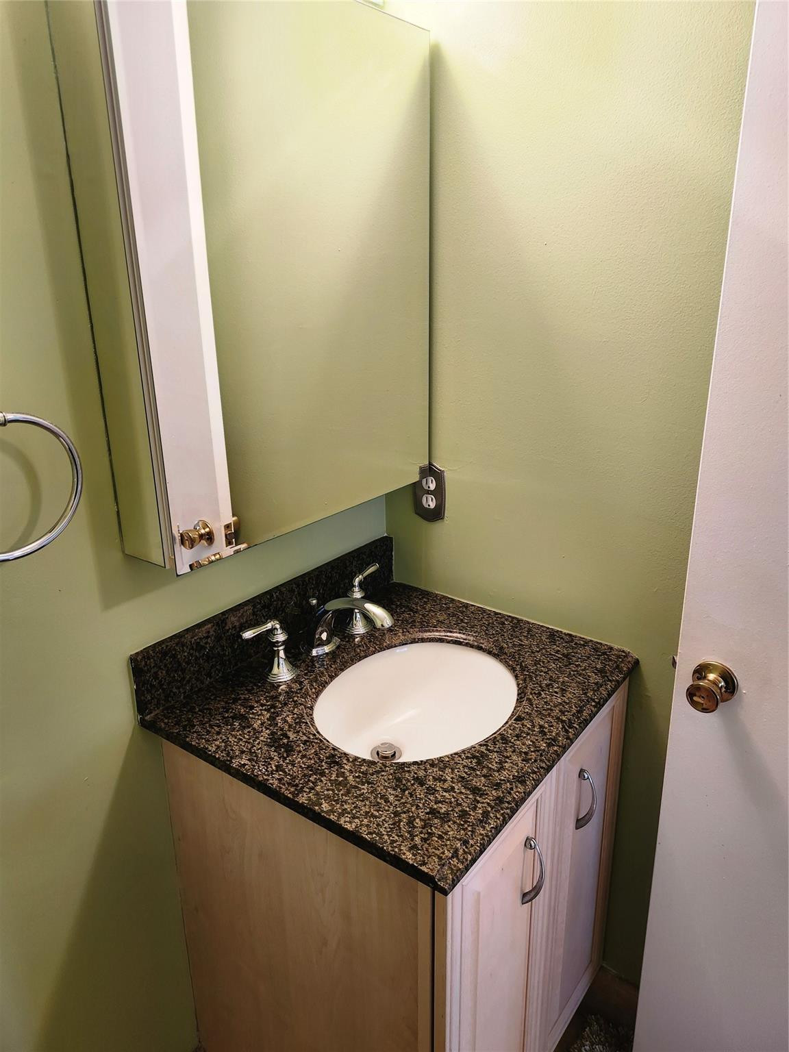 74 Preston Way Boca Raton, FL 33434 - Photo 23 of 28 a bathroom with a granite countertop sink and a mirror
