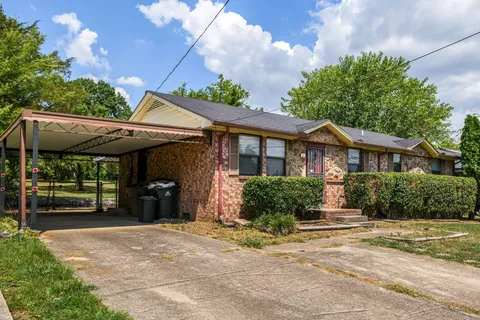 a view of a house with a patio