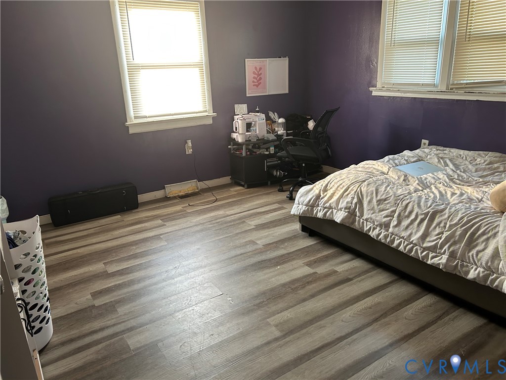 13691 Mountain Road Glen Allen, VA 23059 - Photo 13 of 13 Room featuring wood-finish flooring, two windows w