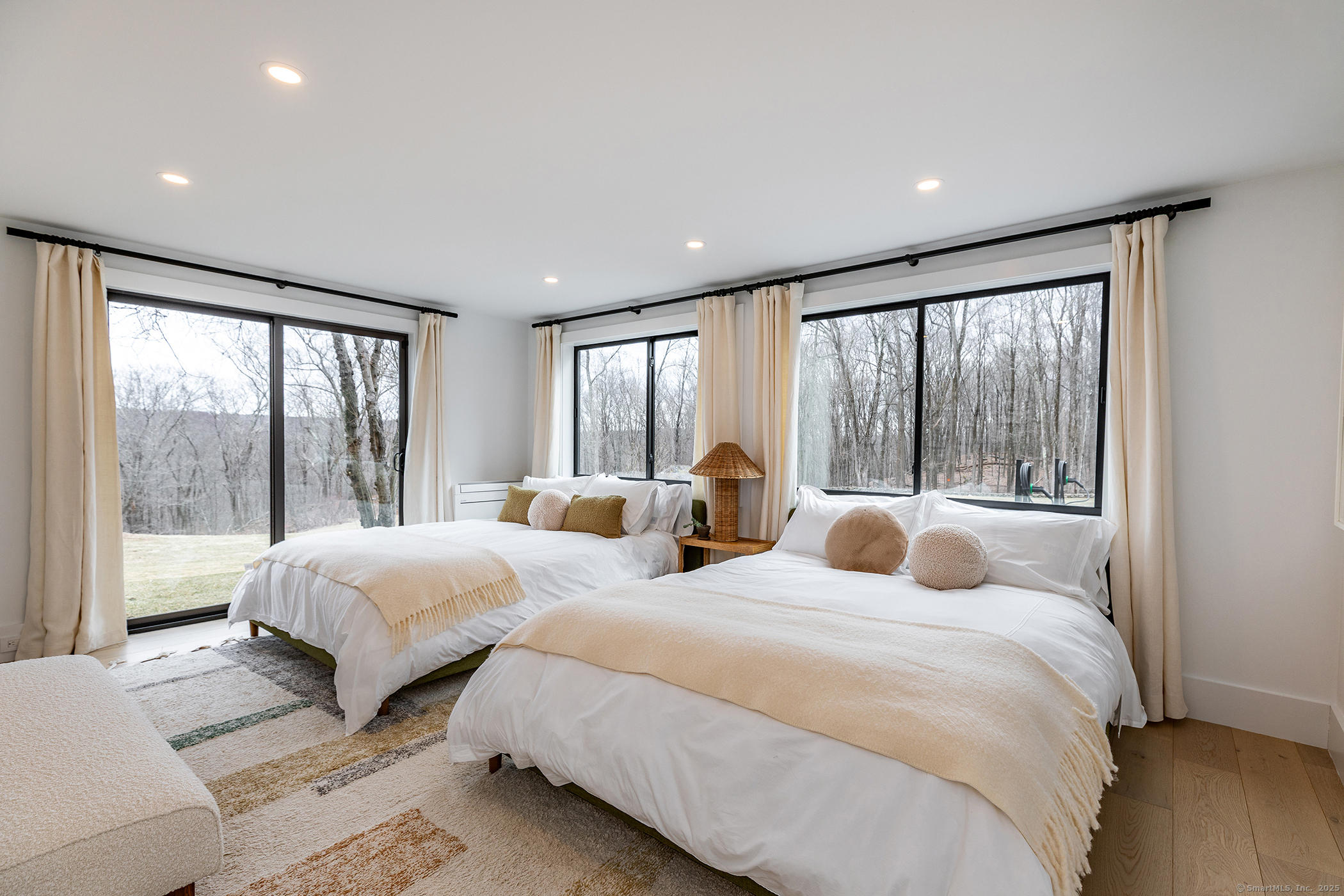 34 Old Roxbury Road Roxbury, CT 06783 - Photo 19 of 29 a bedroom with two beds and a large window