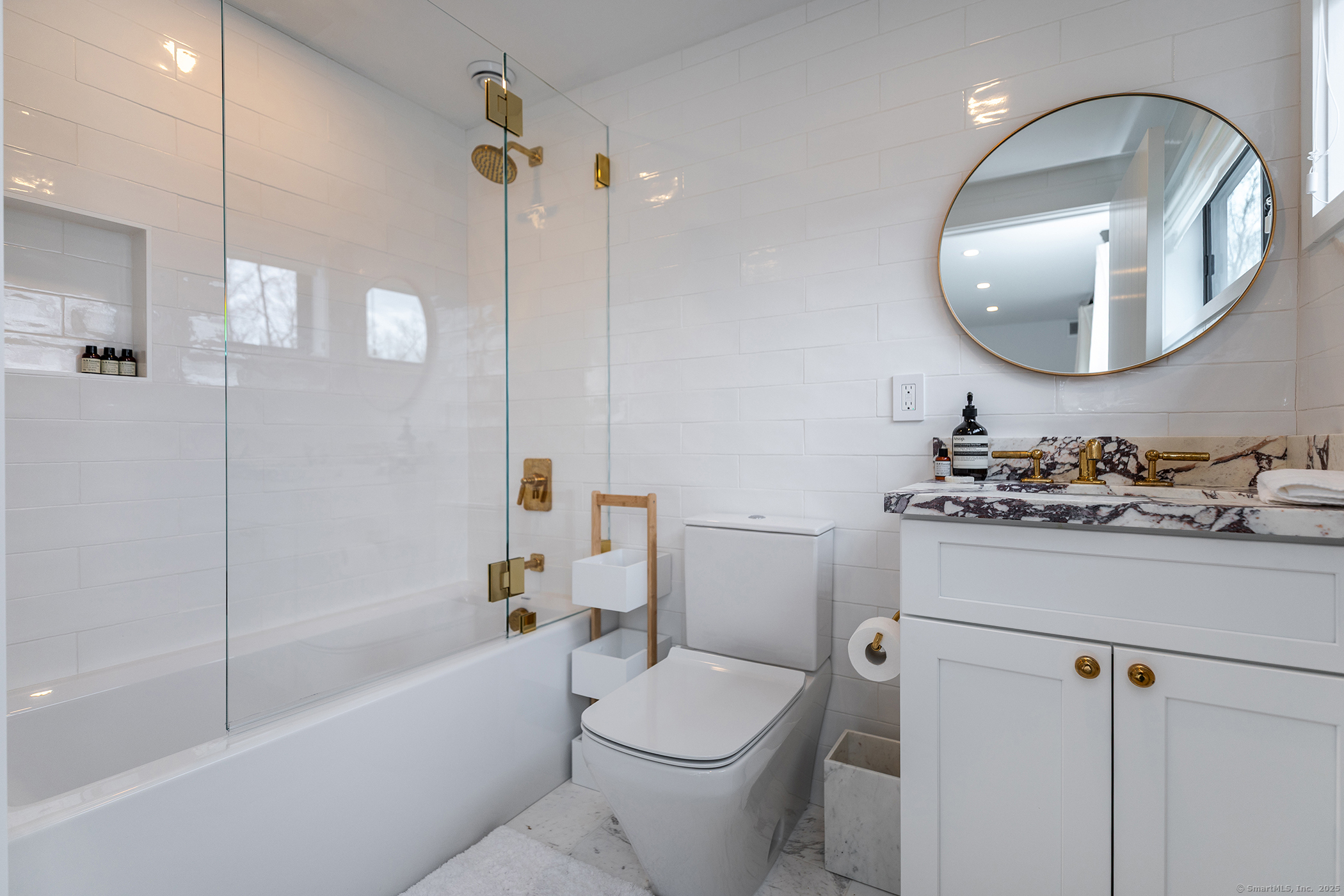 34 Old Roxbury Road Roxbury, CT 06783 - Photo 22 of 29 a bathroom with a sink a toilet and a mirror