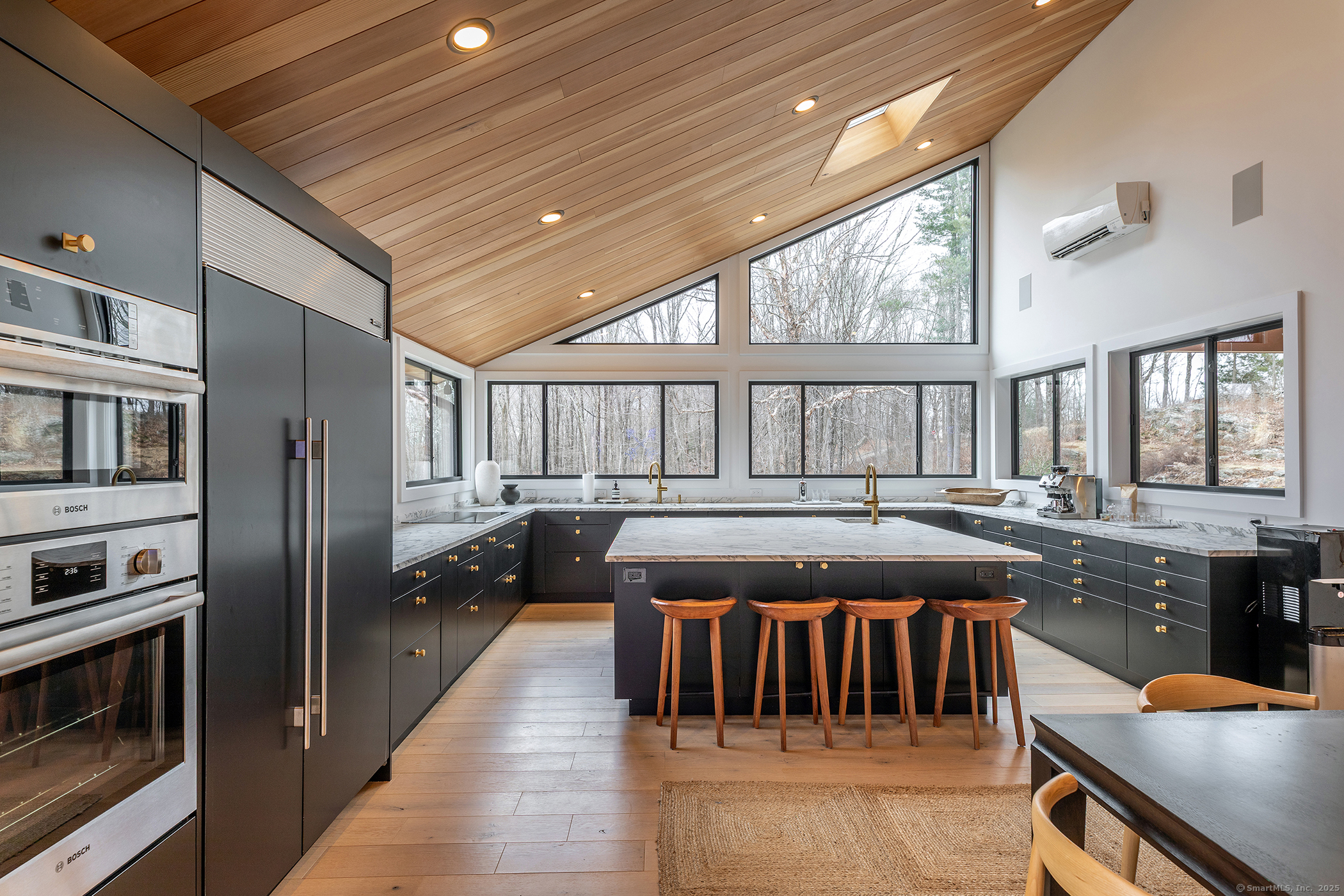 34 Old Roxbury Road Roxbury, CT 06783 - Photo 4 of 29 a kitchen with stainless steel appliances granite countertop a stove a sink and a refrigerator
