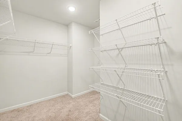 a view of a room with racks on the wall