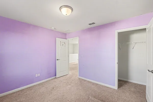 an empty room with closet
