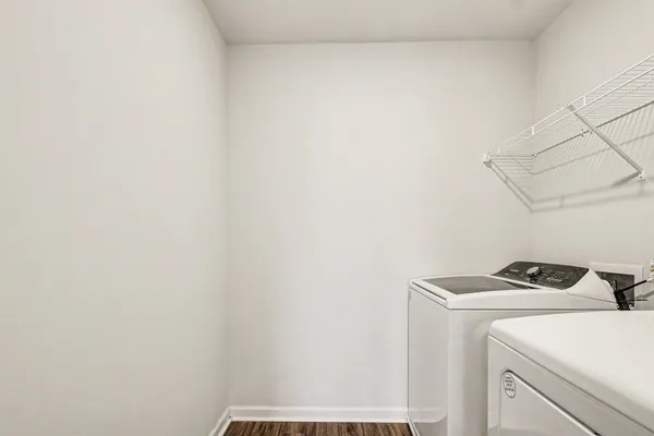 a utility room with dryer and washer