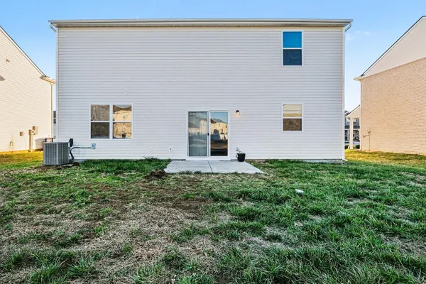 a house view with a backyard space
