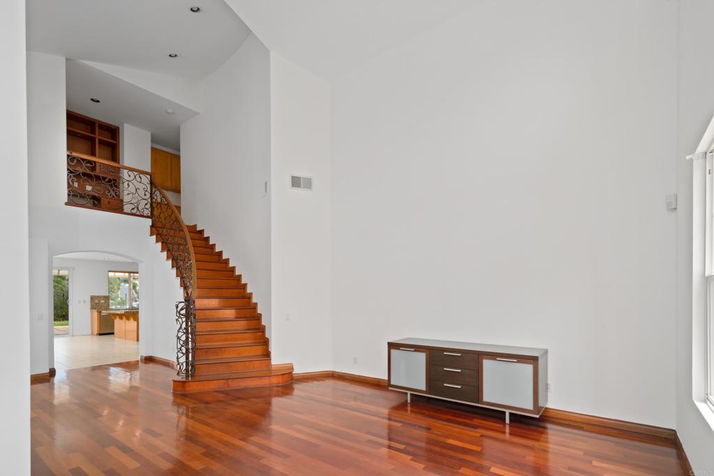 1917 Lagrange Road Chula Vista, CA 91913 - Photo 5 of 36 a view of an empty room with wooden floor and stairs