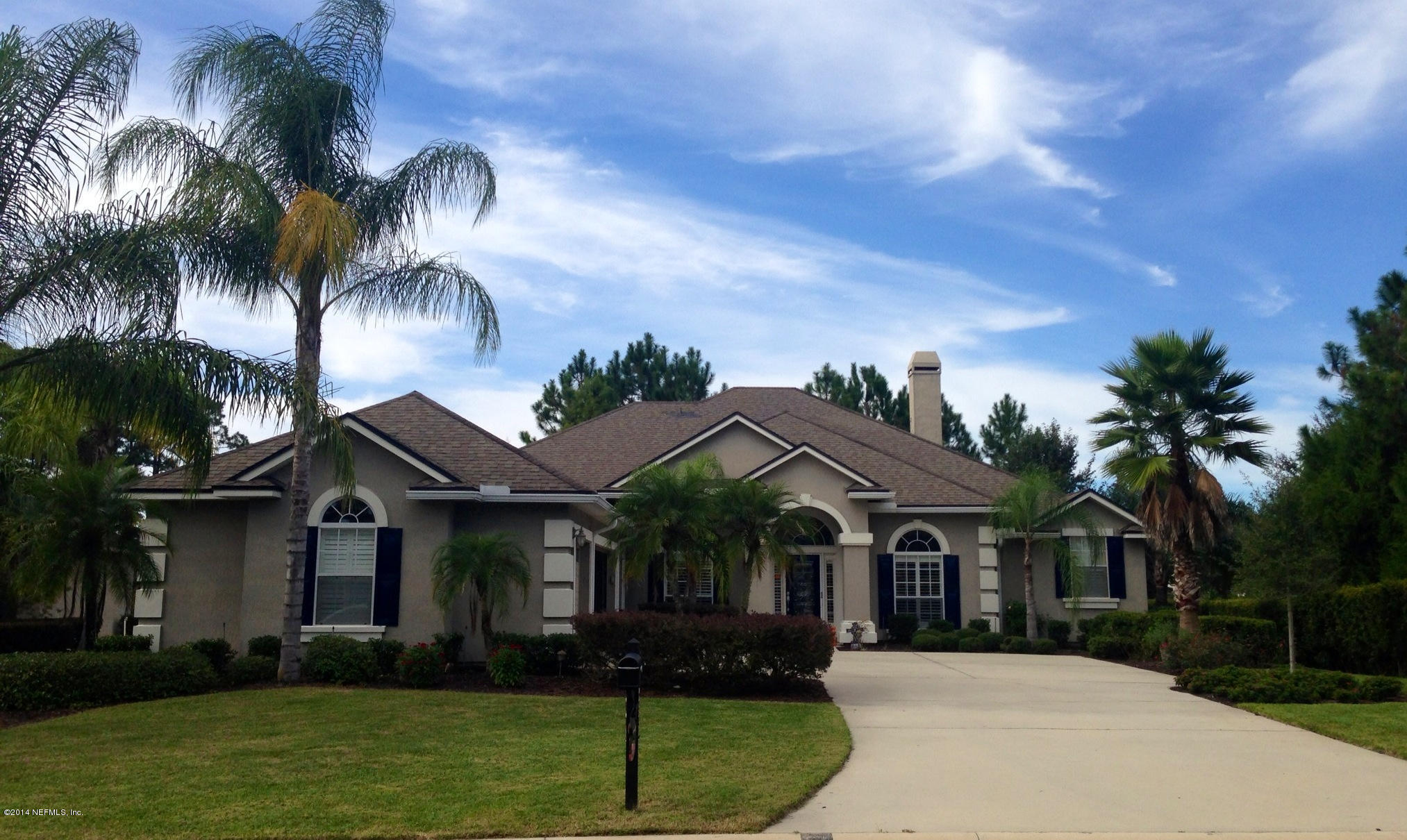 2001 River's Own Road St. Augustine, FL 32092 - Photo 1 of 55 a front view of a house with a garden