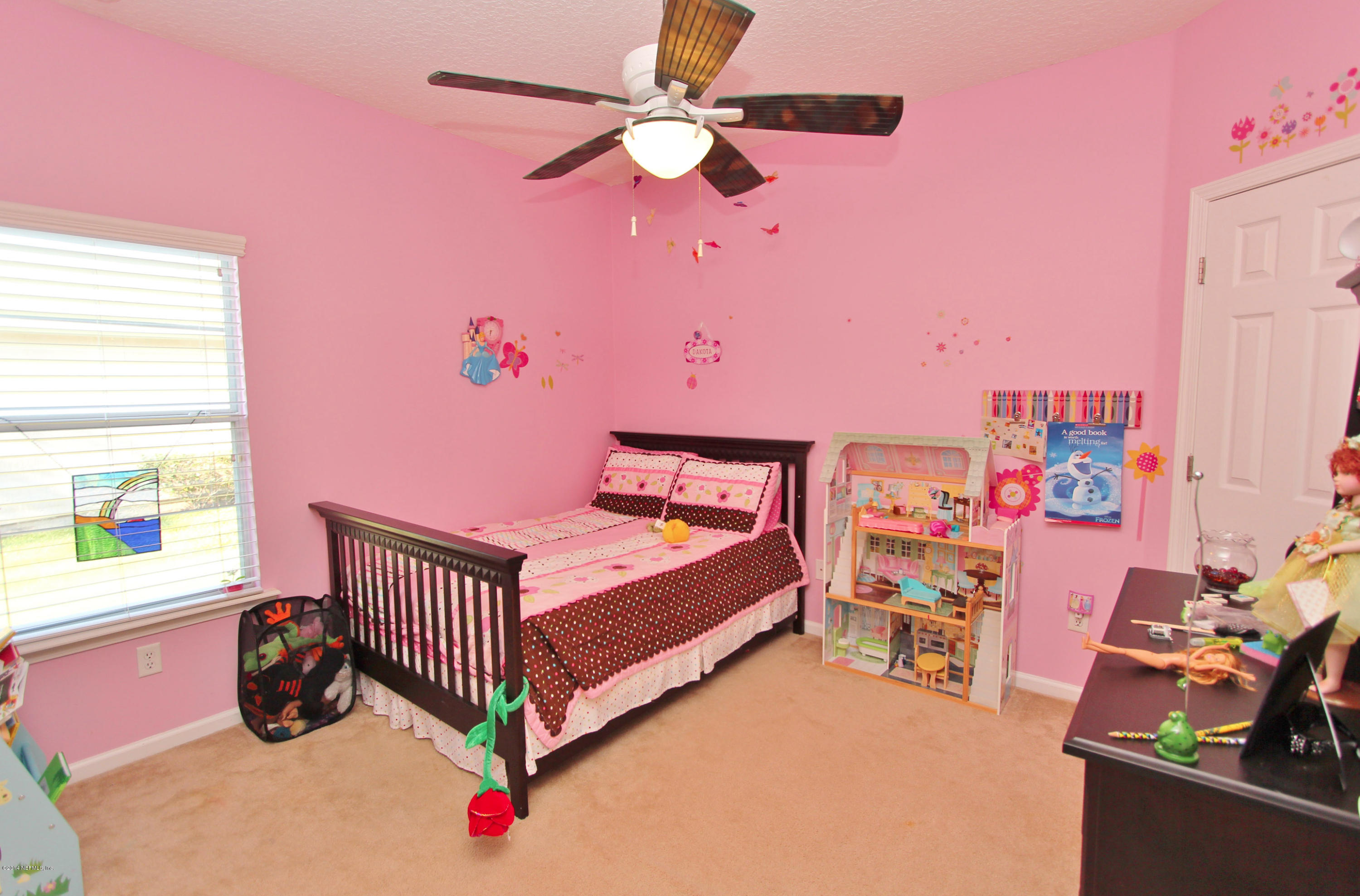 2001 River's Own Road St. Augustine, FL 32092 - Photo 23 of 55 a bed room with a bed and a window