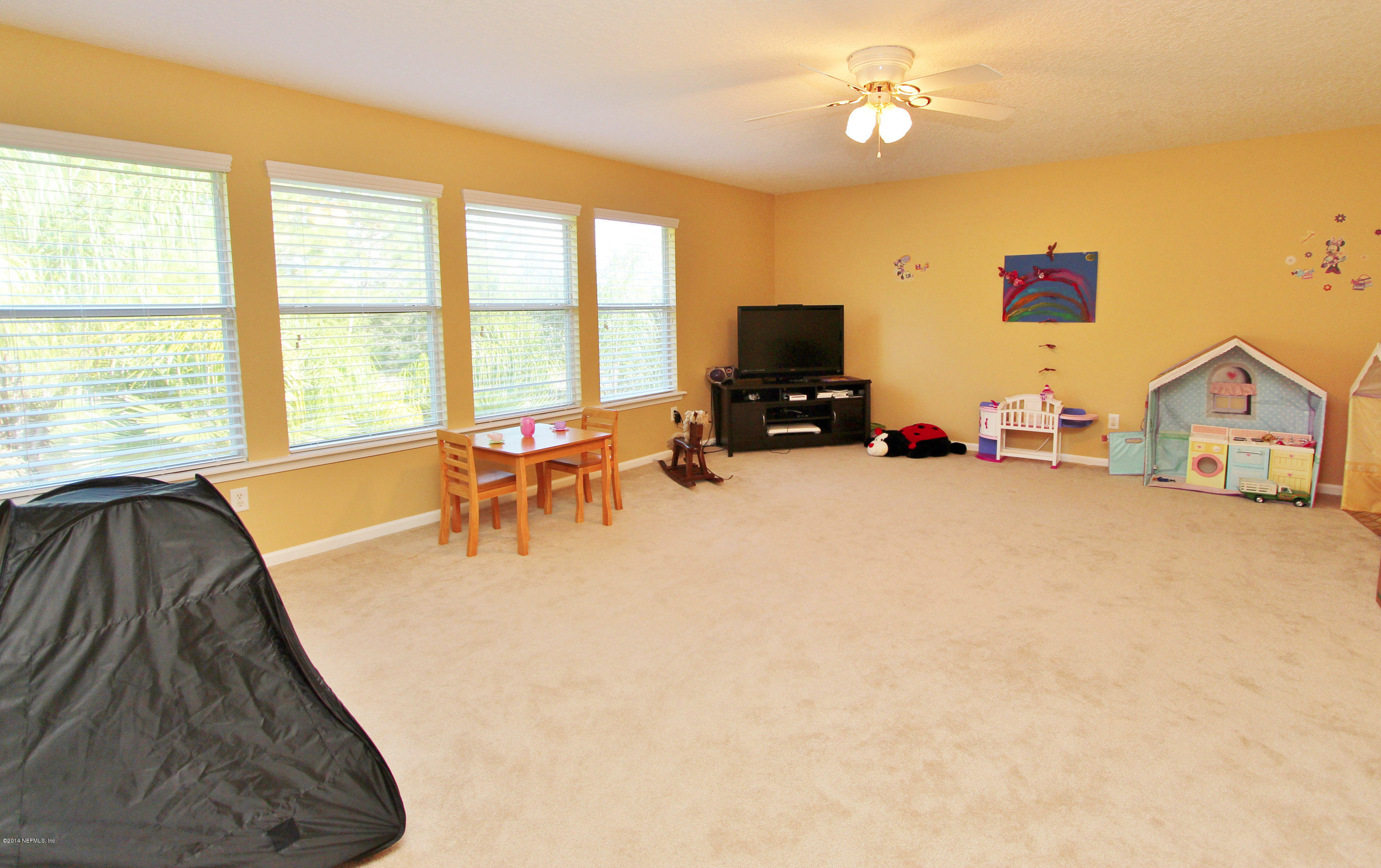 2001 River's Own Road St. Augustine, FL 32092 - Photo 25 of 55 a view of living room with furniture and a flat screen tv