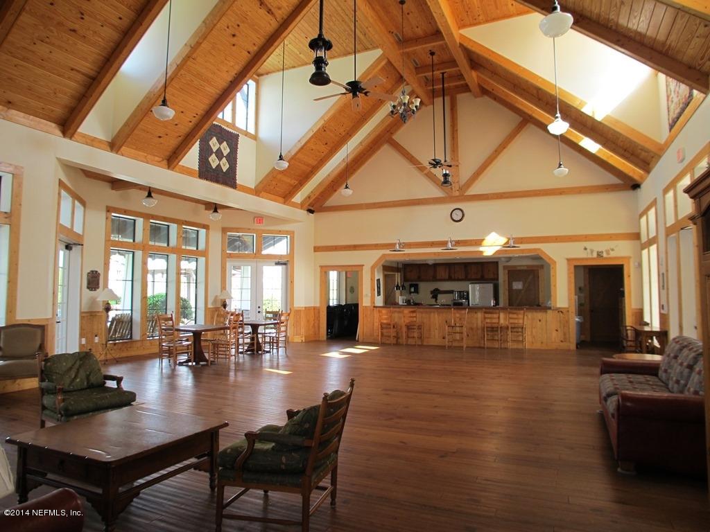 2001 River's Own Road St. Augustine, FL 32092 - Photo 39 of 55 a view of a dining room with furniture