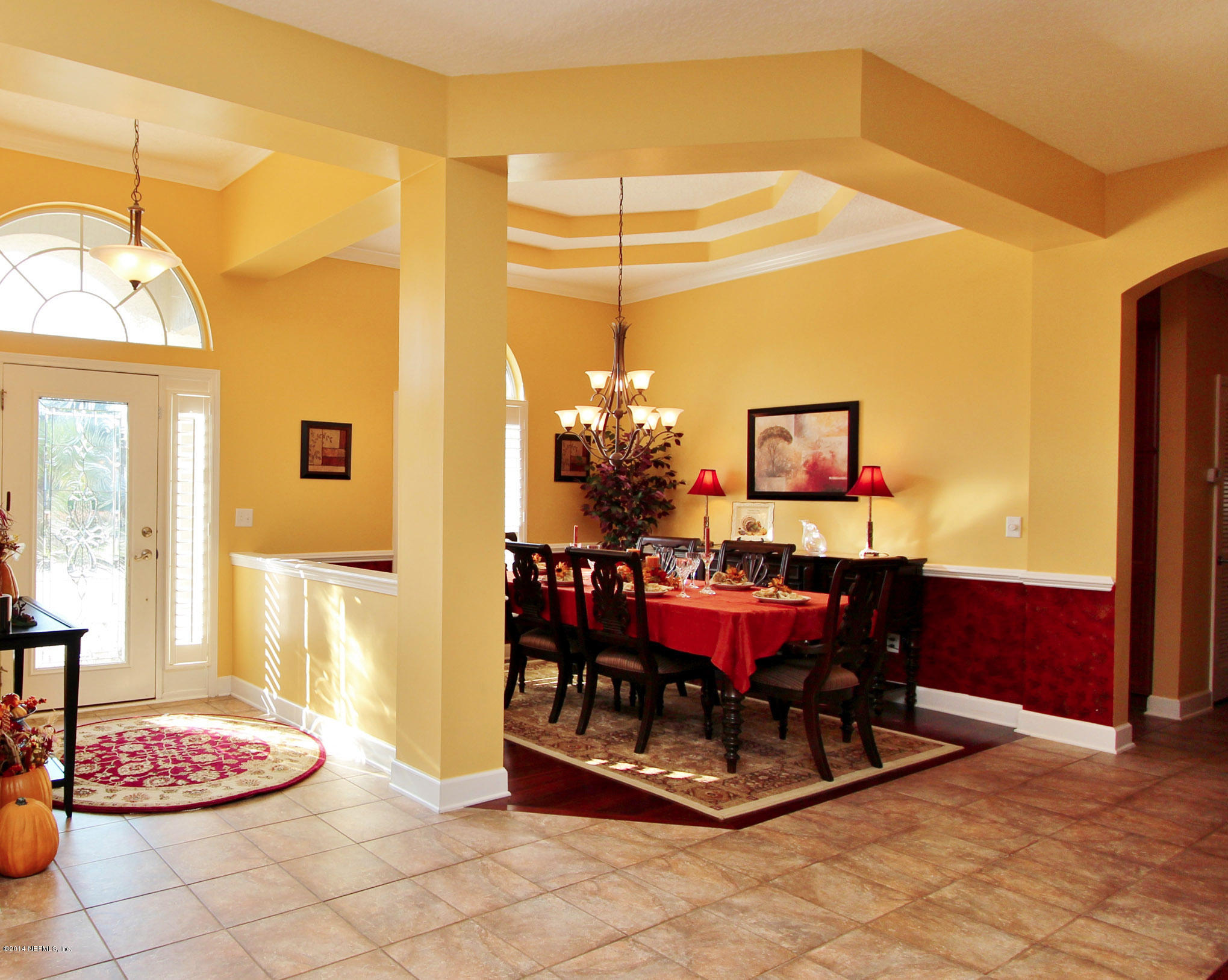 2001 River's Own Road St. Augustine, FL 32092 - Photo 5 of 55 a dining room with a table and chairs