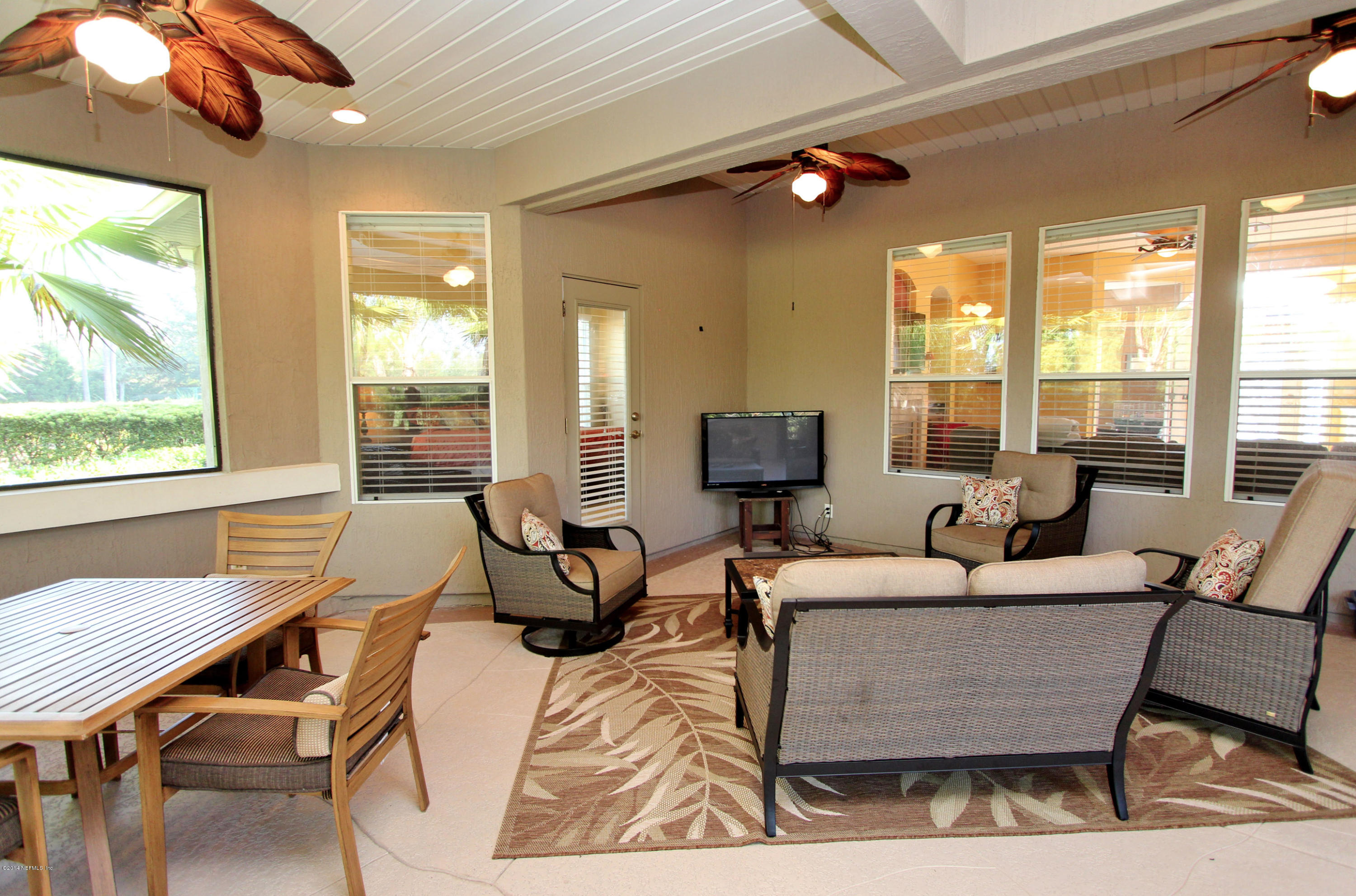 2001 River's Own Road St. Augustine, FL 32092 - Photo 9 of 55 a living room with furniture and a large window