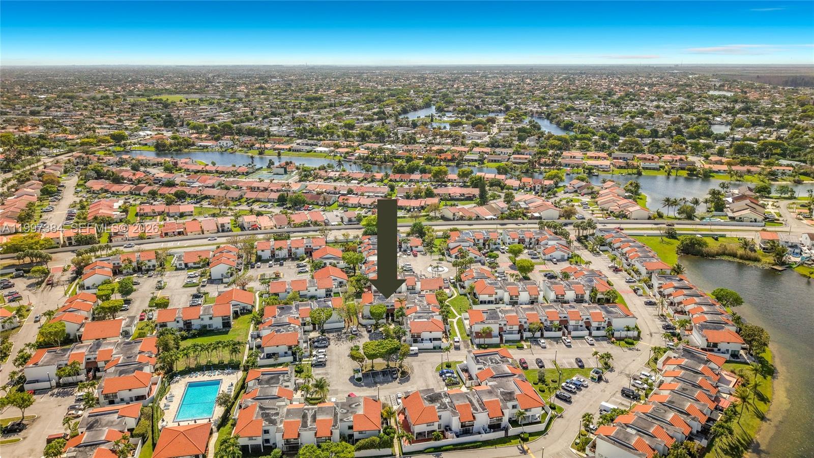 1291 Southwest 124th Court, Unit 19B Miami, FL 33184 - Photo 30 of 33 an aerial view of residential houses with outdoor space