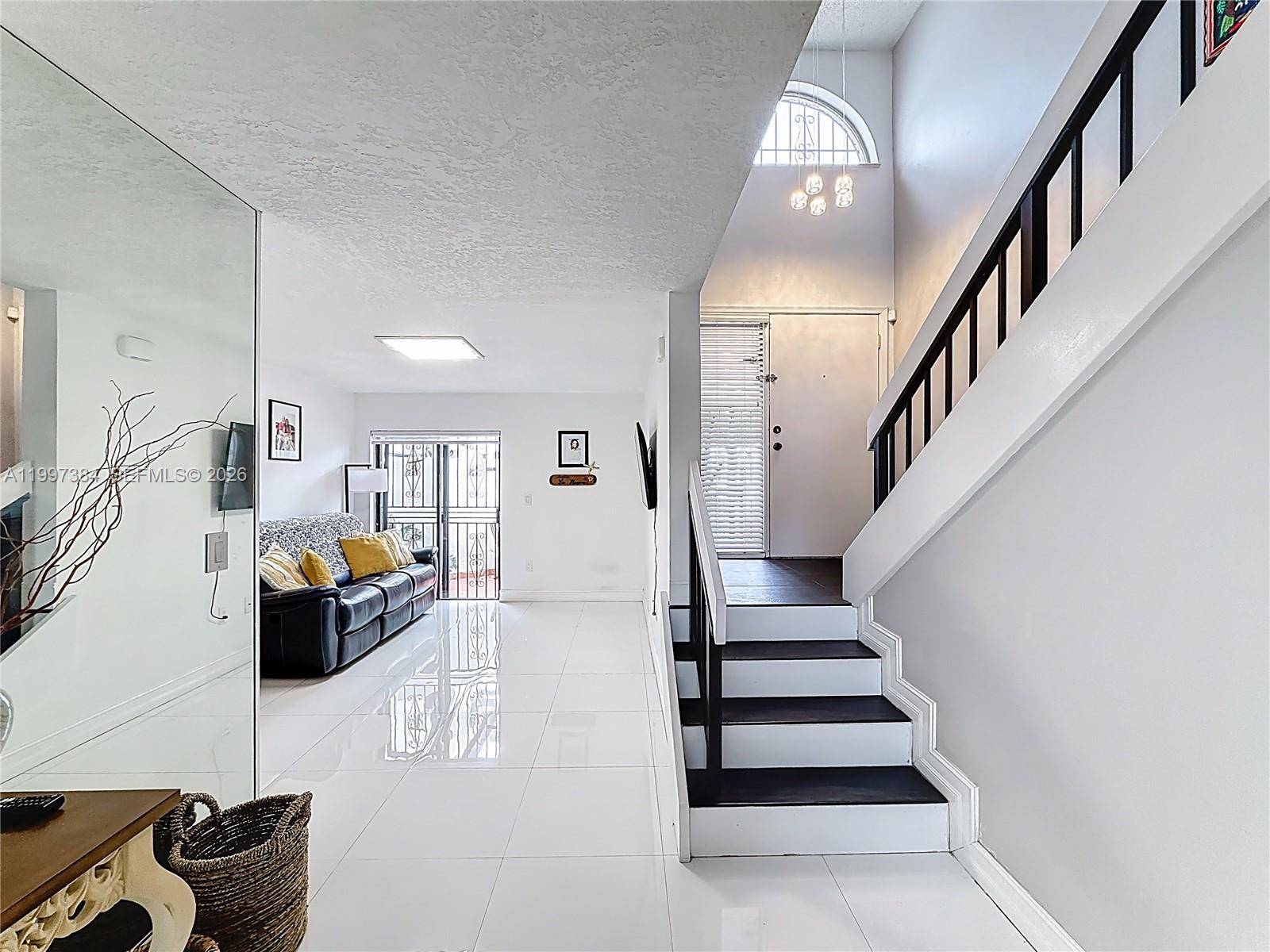 1291 Southwest 124th Court, Unit 19B Miami, FL 33184 - Photo 4 of 33 a view of entryway and hall