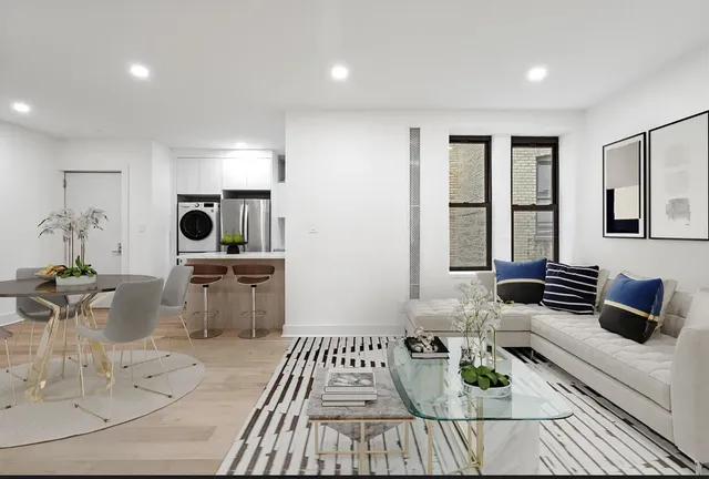 a kitchen with a stove a microwave and refrigerator