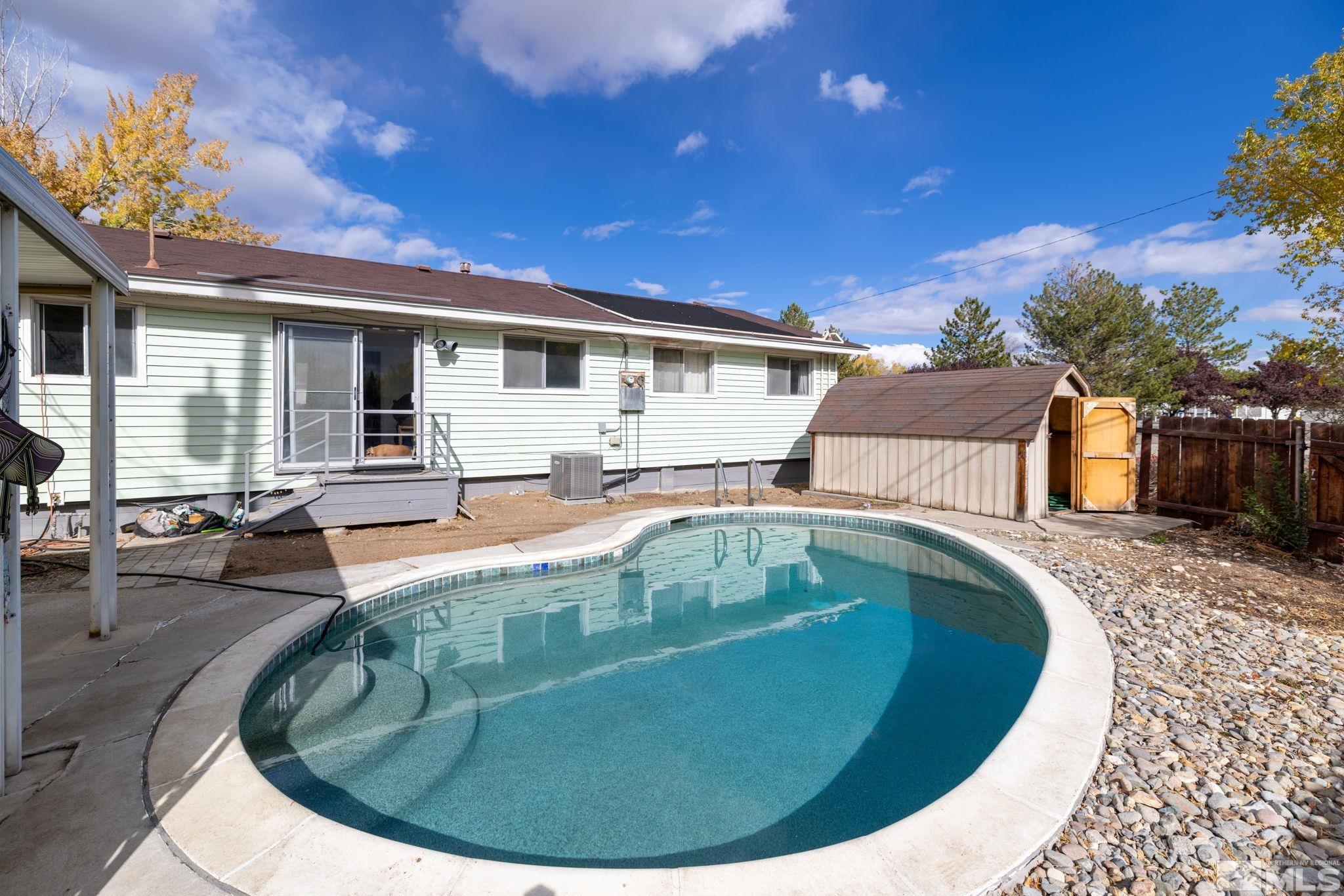 2400 Apollo Way Reno, NV 89503 - Photo 30 of 30 a view of a house with swimming pool