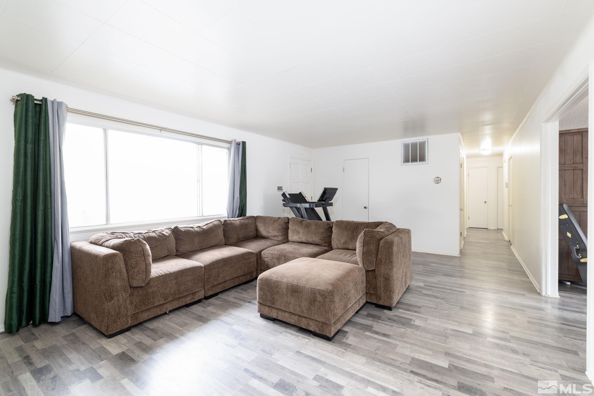 2400 Apollo Way Reno, NV 89503 - Photo 7 of 30 a living room with furniture and a large window