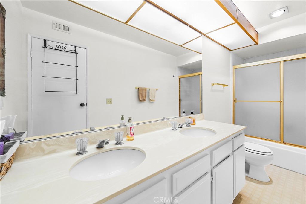 1140 East Ocean Boulevard, Unit 228 Long Beach, CA 90802 - Photo 11 of 27 Bathroom w/double sinks, tub, shower