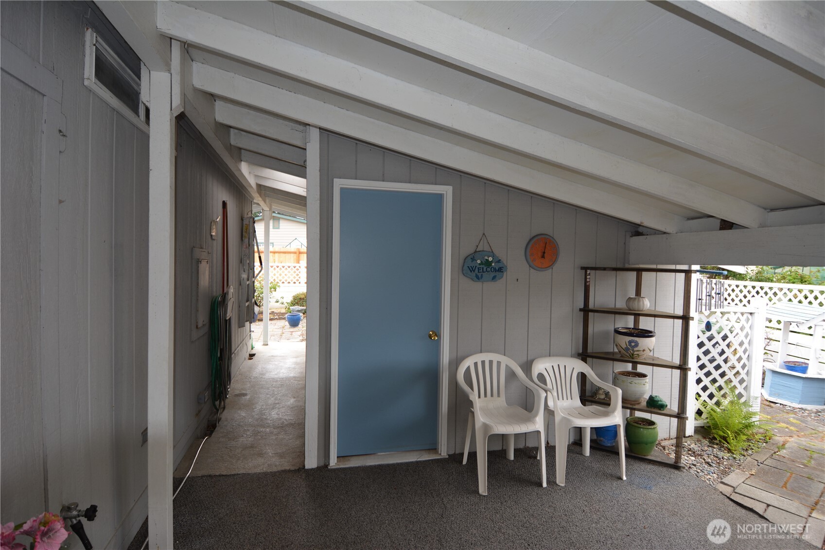 20 Brett Circle Sequim, WA 98382 - Photo 21 of 36 a dining room with furniture and a chandelier
