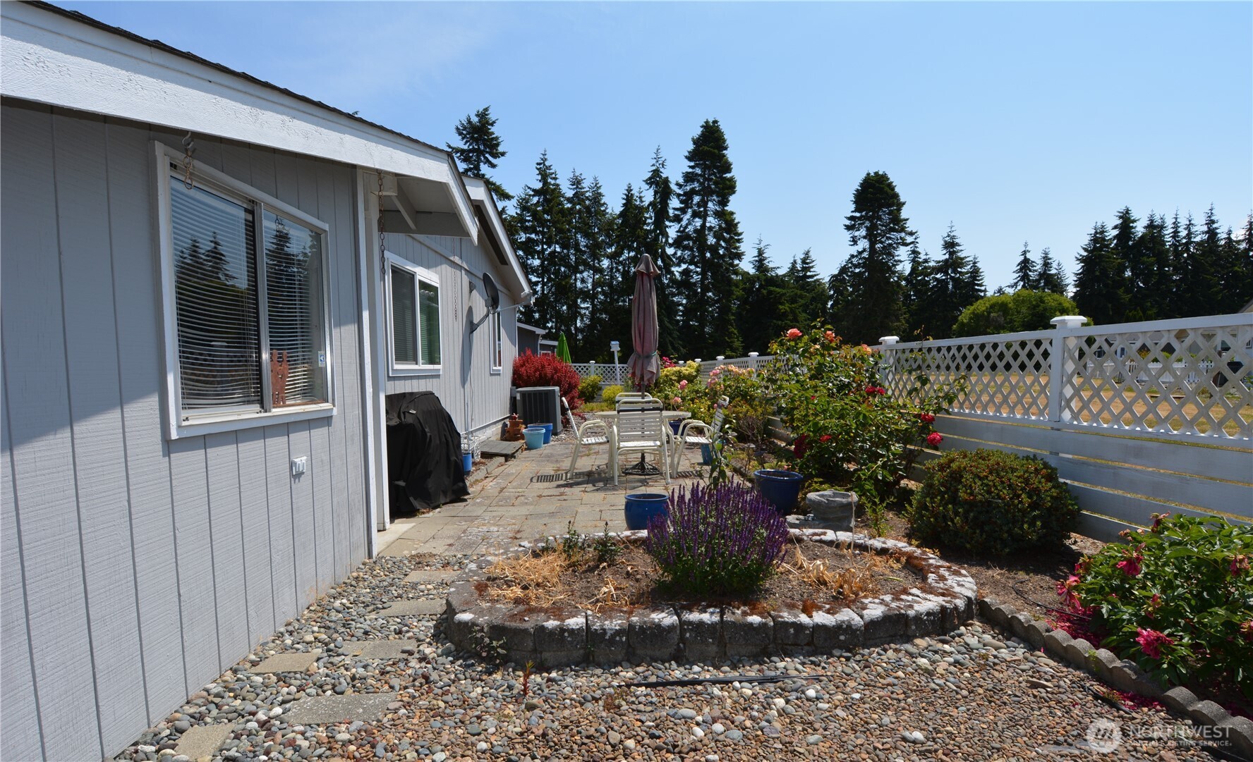 20 Brett Circle Sequim, WA 98382 - Photo 34 of 36 a view of a house with backyard and sitting area