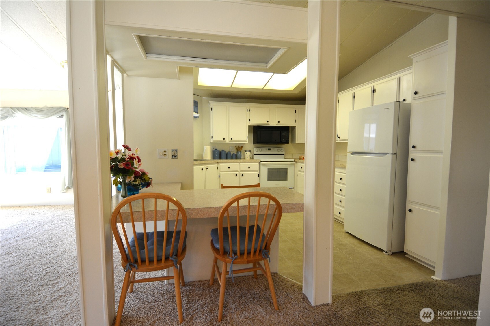 20 Brett Circle Sequim, WA 98382 - Photo 6 of 36 a view of a dining room with furniture window and outside view