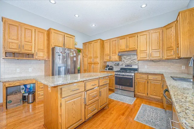 $675,000 | 7087 Wellington Lane North, Maple Grove, MN 55369