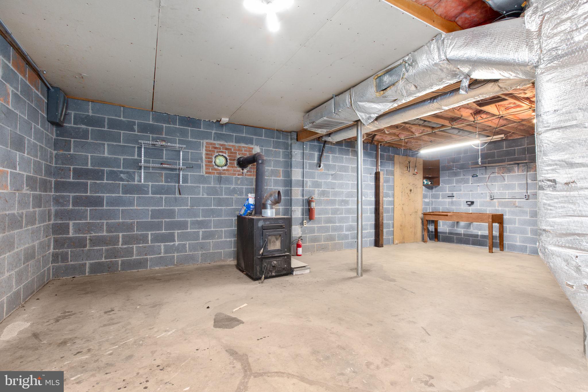 20537 Fields Mill Road Richardsville, VA 22736 - Photo 47 of 72 Wood Stove as is. Used to heat lower level
