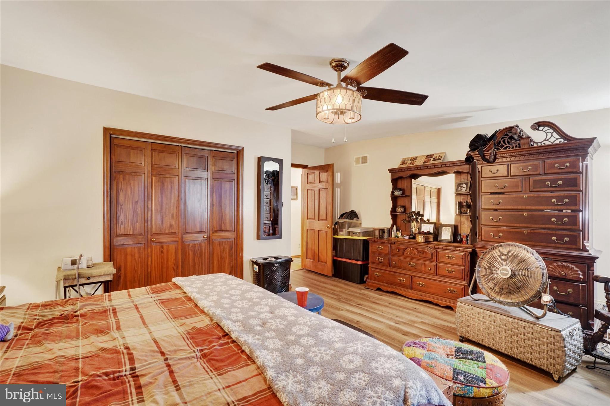 35 Kline Avenue Manchester, PA 17345 - Photo 13 of 28 a bedroom with a bed and wooden floor