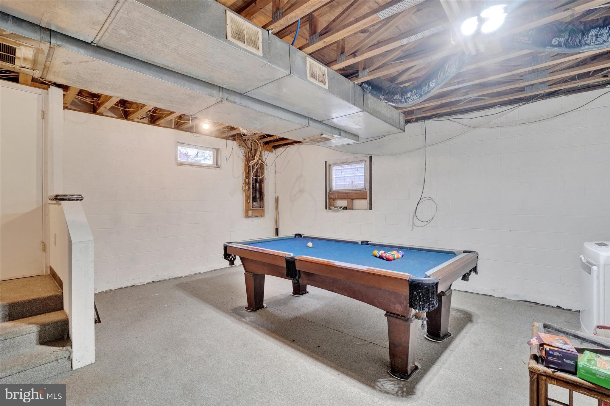 35 Kline Avenue Manchester, PA 17345 - Photo 19 of 28 a room with pool table and a bookshelf