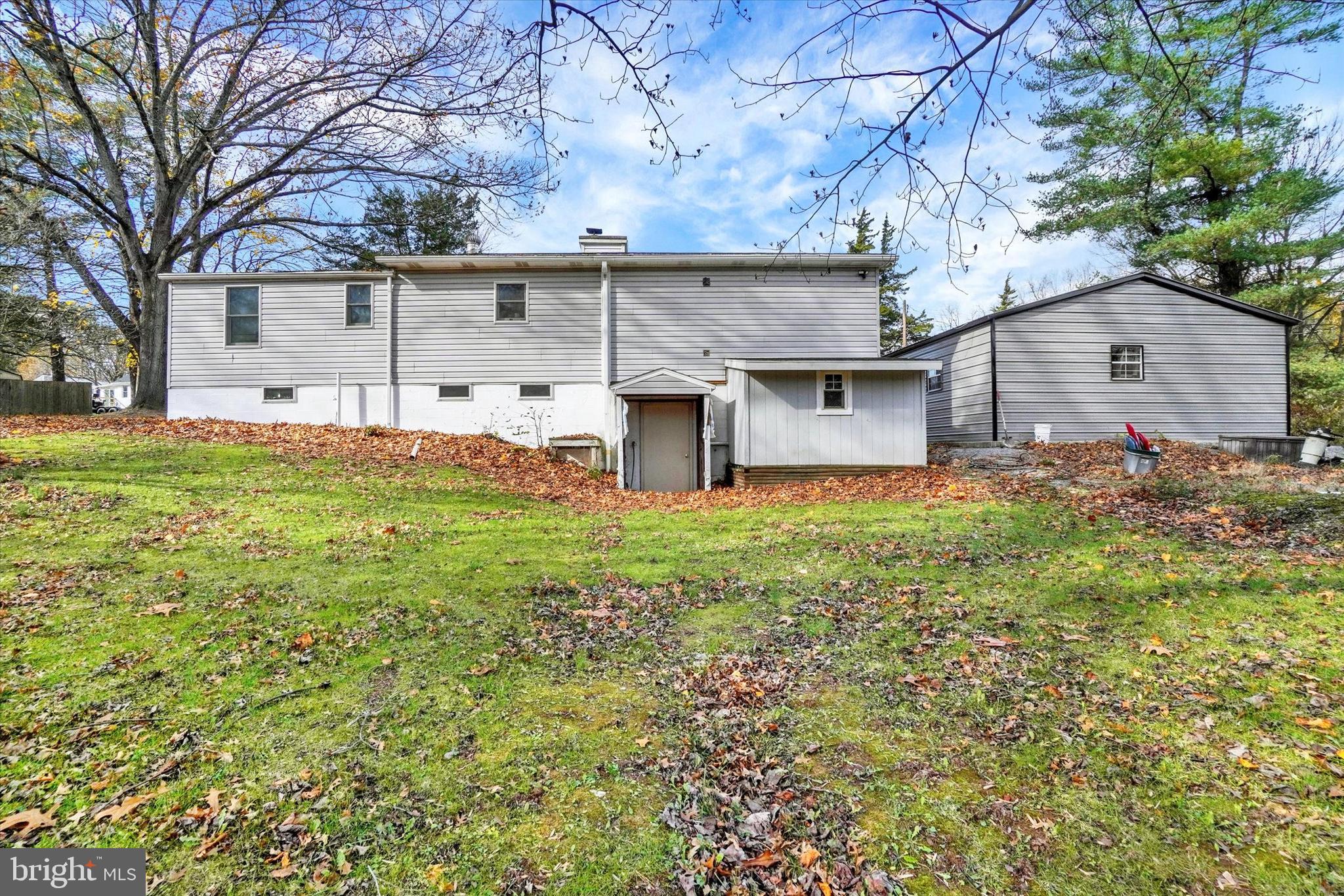 35 Kline Avenue Manchester, PA 17345 - Photo 23 of 28 a view of a house with a large tree and a yard