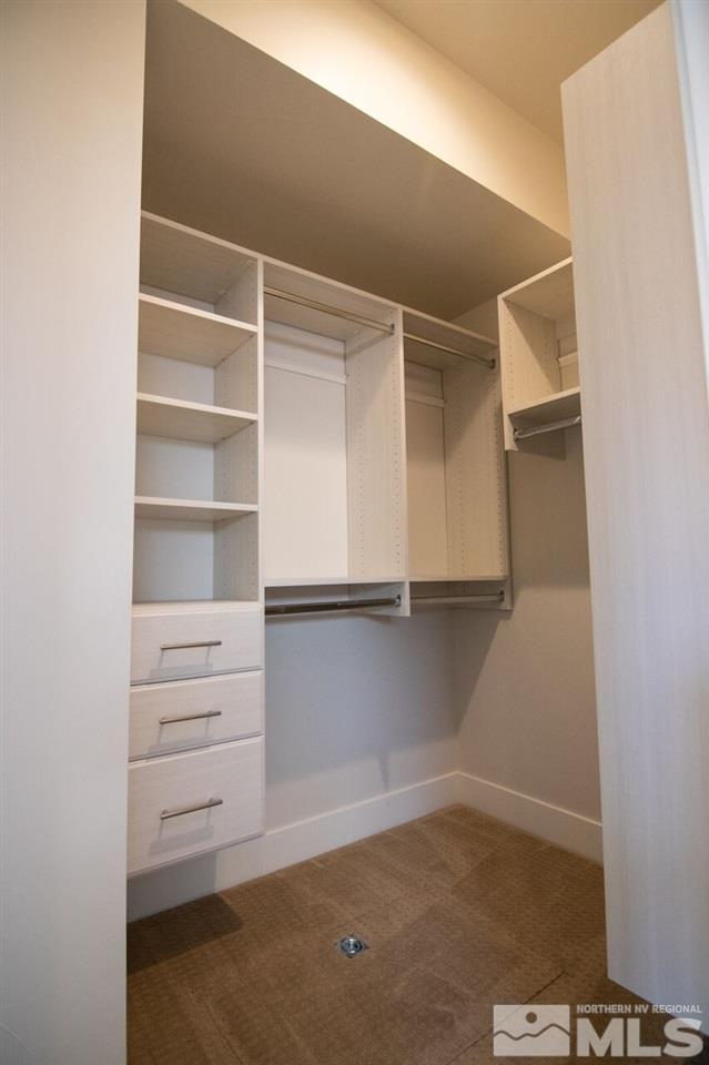 1406 Tonopah Street Reno, NV 89509 - Photo 8 of 23 a view of walk in closet with empty racks