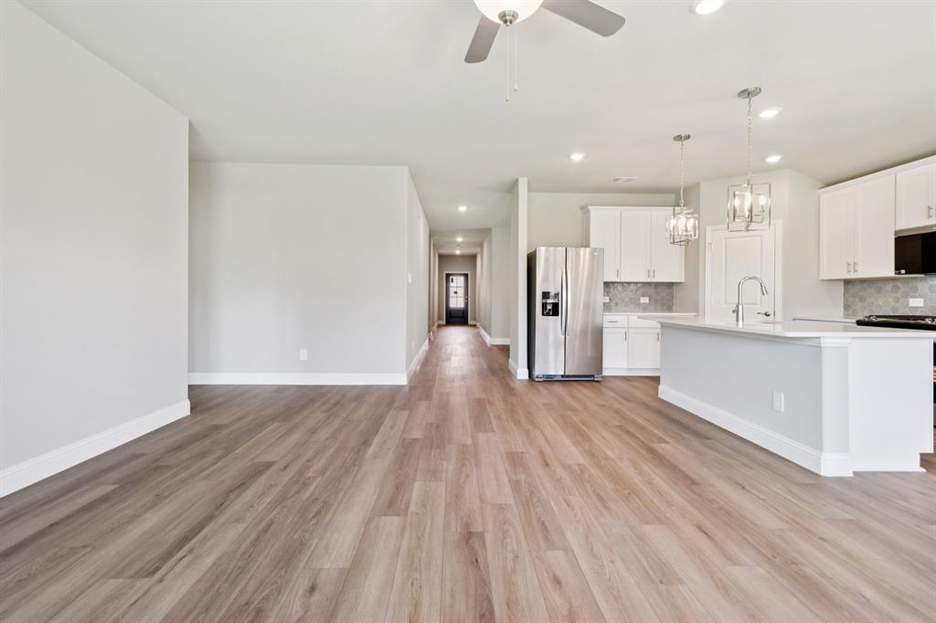 2101 Rannoch Street Sherman, TX 75092 - Photo 16 of 36 a view of kitchen with wooden floor