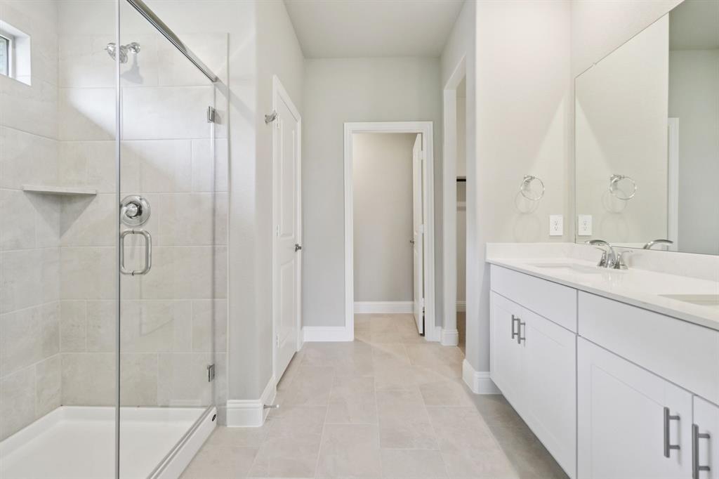 2101 Rannoch Street Sherman, TX 75092 - Photo 21 of 36 a spacious bathroom with a shower and a sink